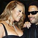 Cast members Mariah Carey and Lenny Kravitz pose on the red carpet as they arrive for the screening of the film `Precious` at the 62nd Cannes Film Festival